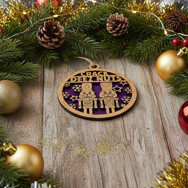Decorative Christmas ornament with text on a wooden surface surrounded by festive decorations.