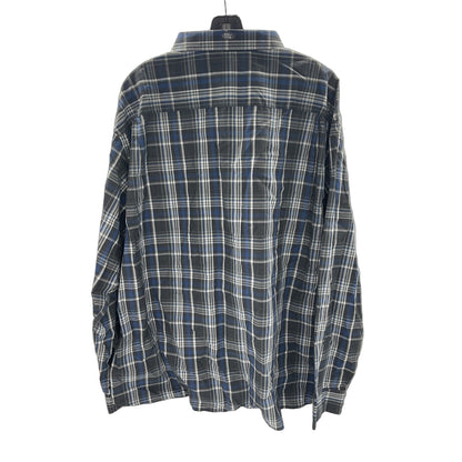 Plaid shirt on a hanger against a white background