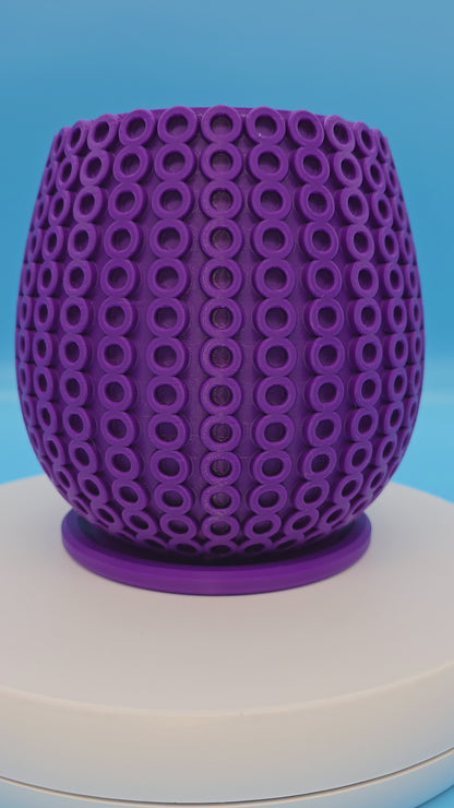 Planter with circle pattern and drip tray