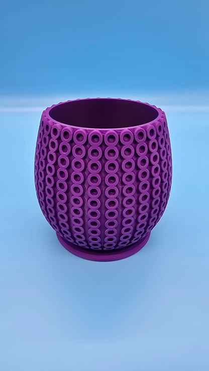 Planter with circle pattern and drip tray