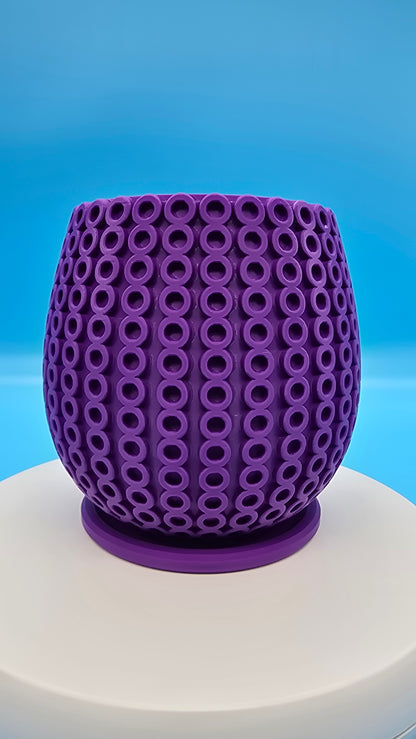 Planter with circle pattern and drip tray